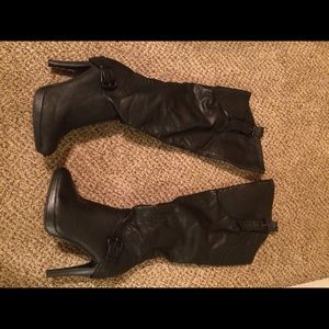 Black below the knee heeled leather boots