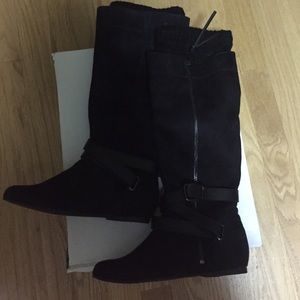 Winter knee high boots.