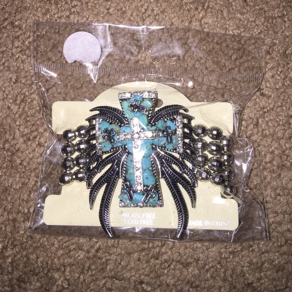 Rustic wing and cross bracelet!