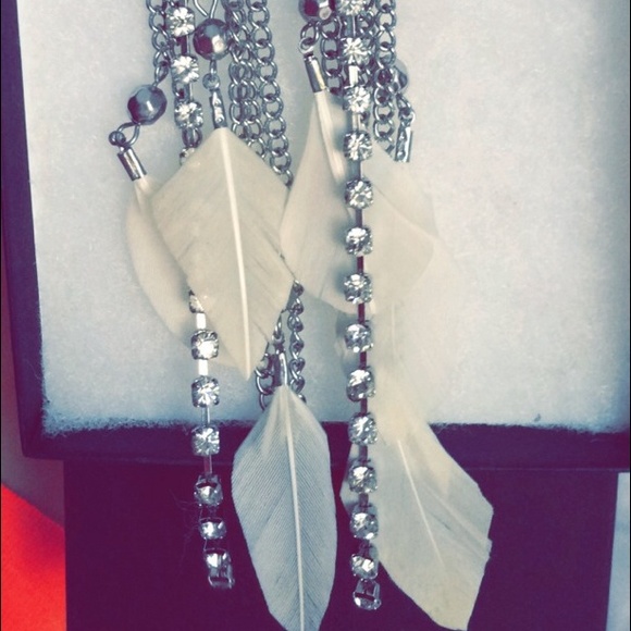 Daring feather earrings