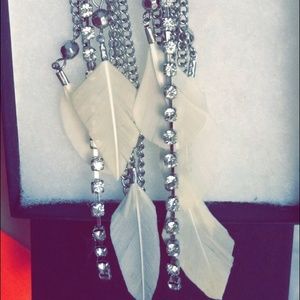 Daring feather earrings