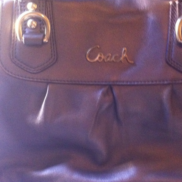 Pewter colored coach hand bag