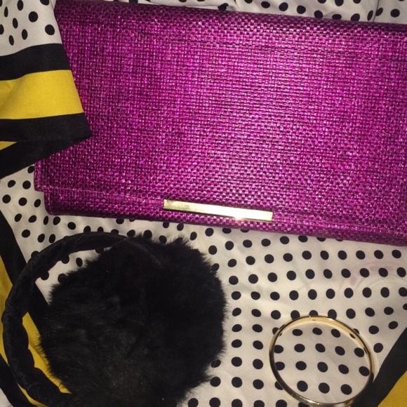 Magenta and gold woven clutch