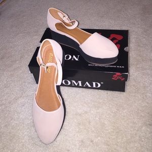 Nude/Black Nomad footwear