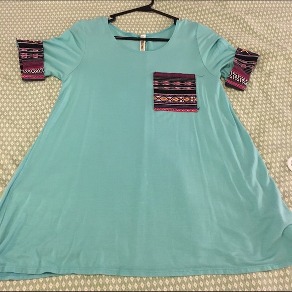Boutique top Aztec detailing tunic length
