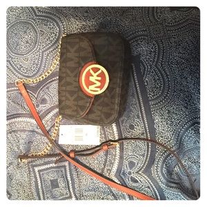 Michael Kors small cross body bag with tags