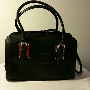 Large black clutch purse by Melie Bianco
