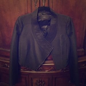 Short BCBG black blazer.