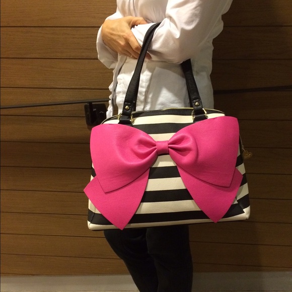 Stylish bag by "Betsey Johnson".
