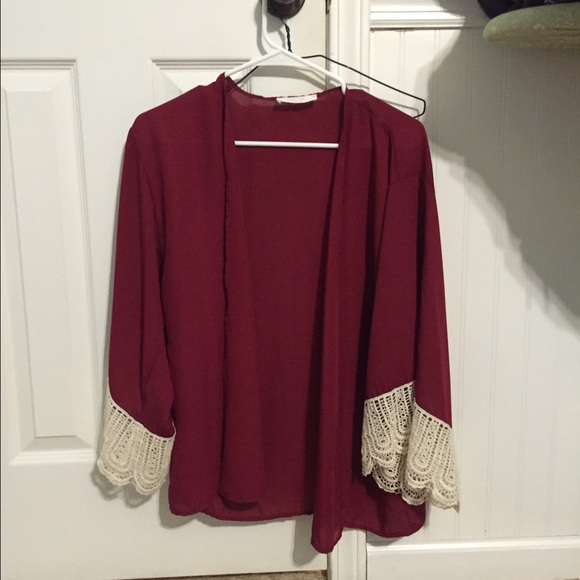 Red cardigan with sleeve laced trim
