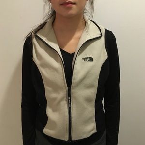 Black and white north face fleece vest