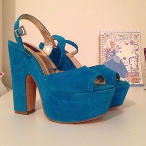 Chunky ankle strap heels in bright blue size 7.5