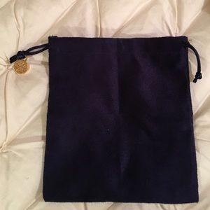 Small Tory Burch Jewelry bag with logo charm