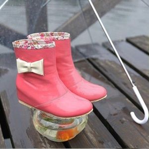 Pink ankle rain boots with hidden wedge and bow