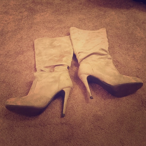 Tan high heeled boots