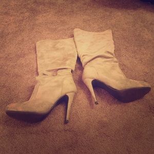 Tan high heeled boots