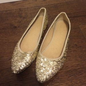 Gold sparkly flats
