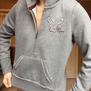 American Eagle distressed hoodie in grey.