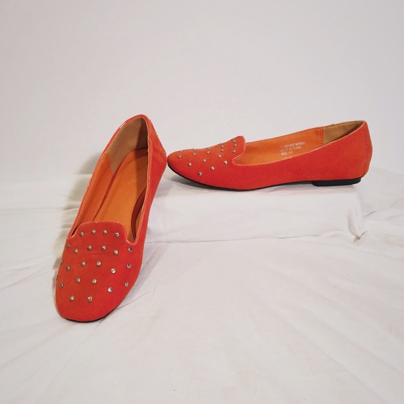 Price drop!! Orange studded Rosette Loafers