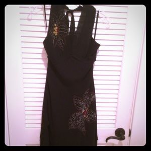 Slinky black BCBGMaxazria halter dress with flower
