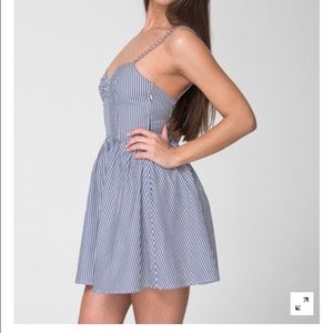 White and navy striped tie back dress