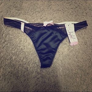 Black silk thong with lace details