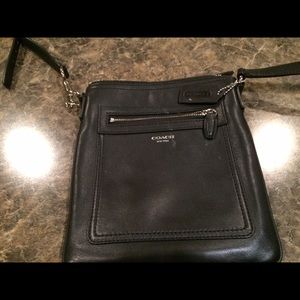 Leather coach black bag . Once used twice .