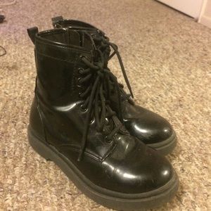 Shiny combat boots