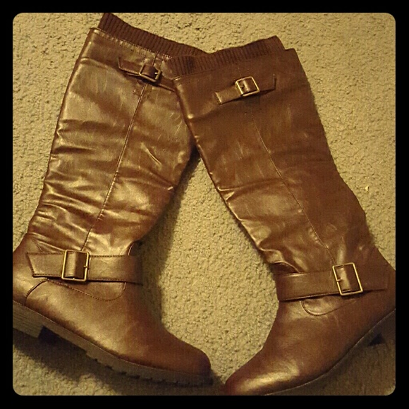 Firm unless bundled Brown knee high boots. Cute!