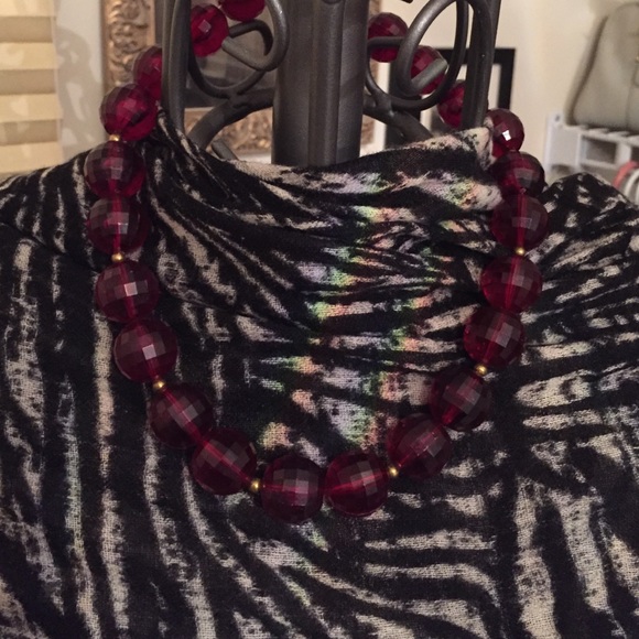 Costume ruby colored bead necklace