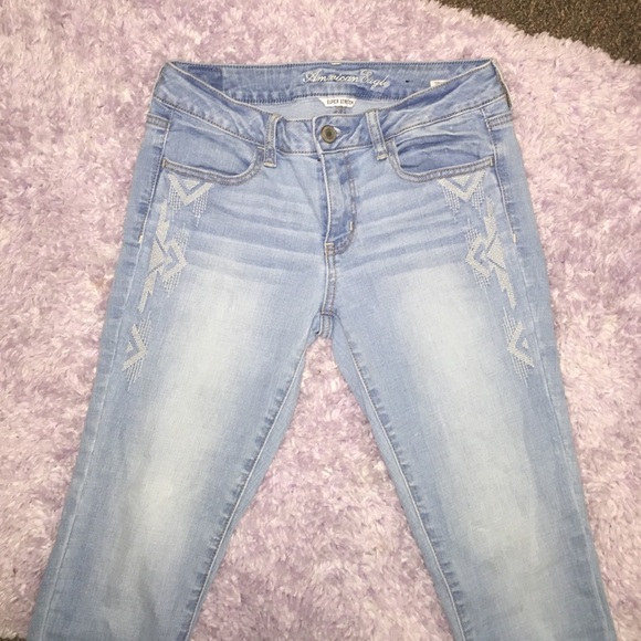 Light wash jeans with Tribal pattern