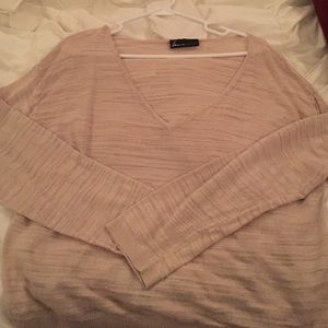 A cream/tan long sleeved shirt for Lane Bryant.