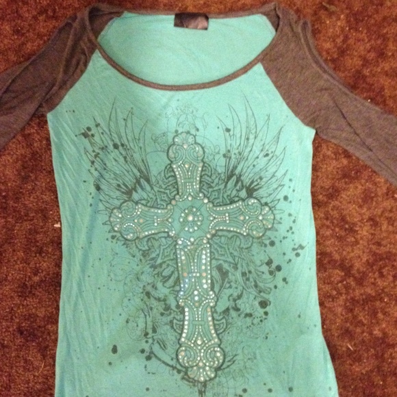 Blue cross shirt.