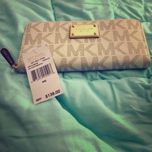 Brand New MK Vanilla Jet Set Wallet!