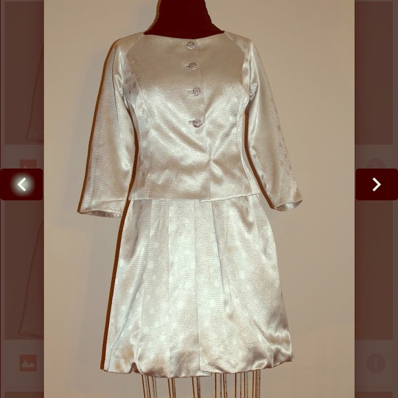 Silver skirt suit with rhinestone buttons