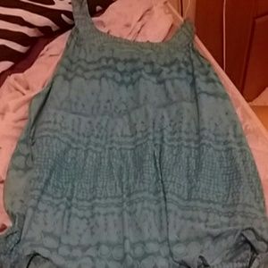 A blue dressy tank top