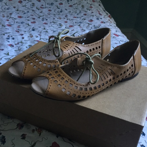Restricted mustard yellow tie sandal flats