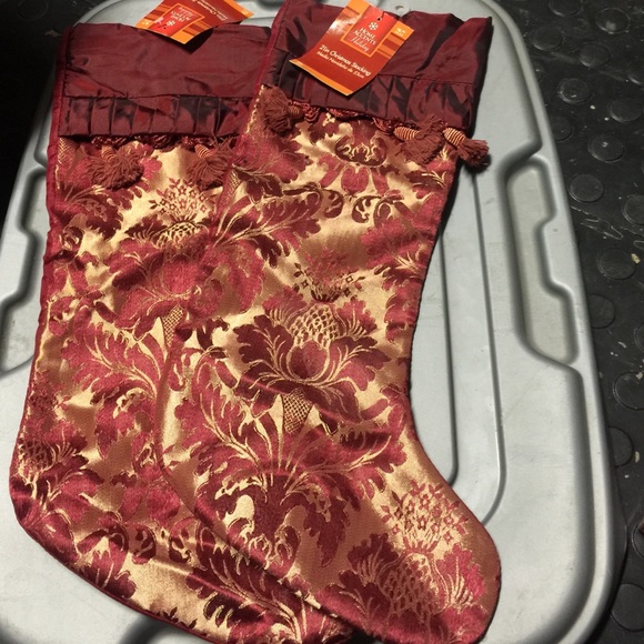 Two brand-new maroon and gold stockings