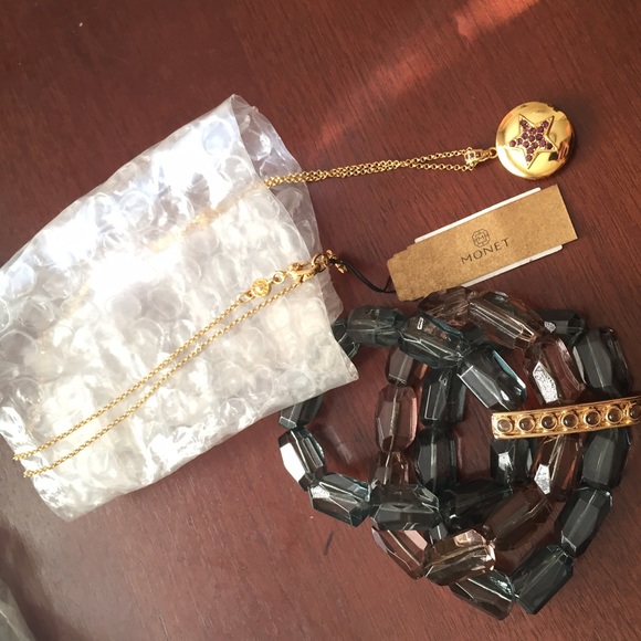 Stretchy bracelets w/ gold star locket