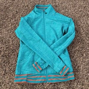 Teal North Face Jacket with orange accent
