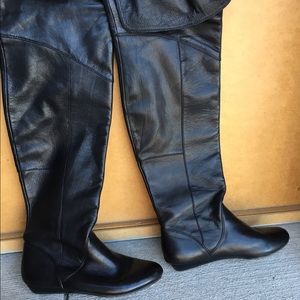 Over the knee report leather boots