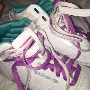 Purple and blue Reebok sneakers