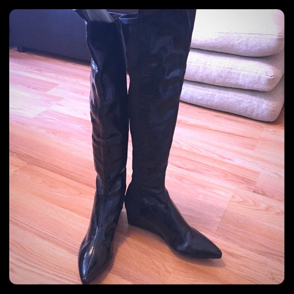 STUART WEITZMAN semi hidden wedge patent leather.