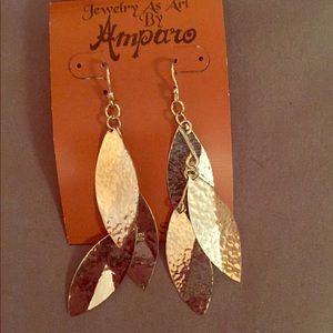 sterling Silver earrings.  NEVER WORN