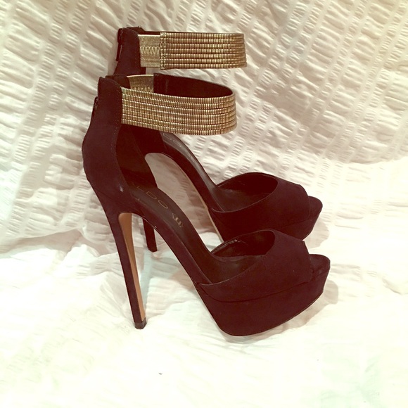 Black and gold ankle strap heels