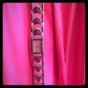 Guess heart shaped band watch.