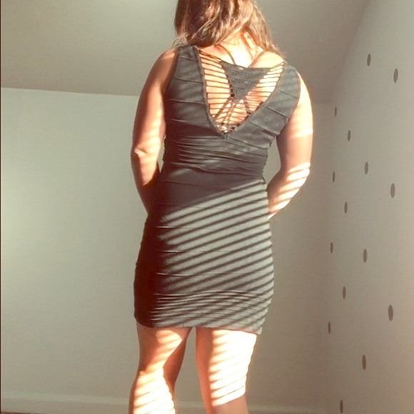 Unique and sexy black dress. Size L