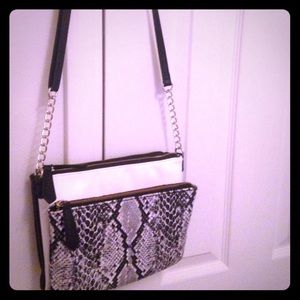 Snakeskin and black n white color block purse