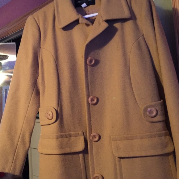 Pant length tan coat.