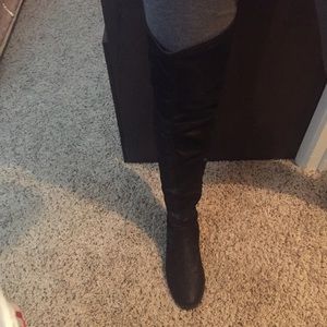 Over the knee black boots